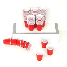 Pack of 100 red durable plastic shot cups 2 oz capacity ideal for drinking and parties