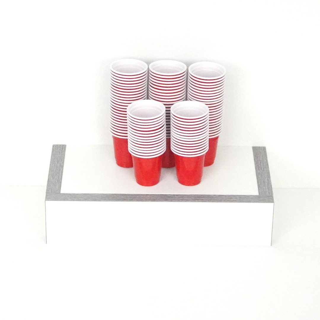 Pack of 100 red reusable shot cups 2 oz capacity perfect for parties and events