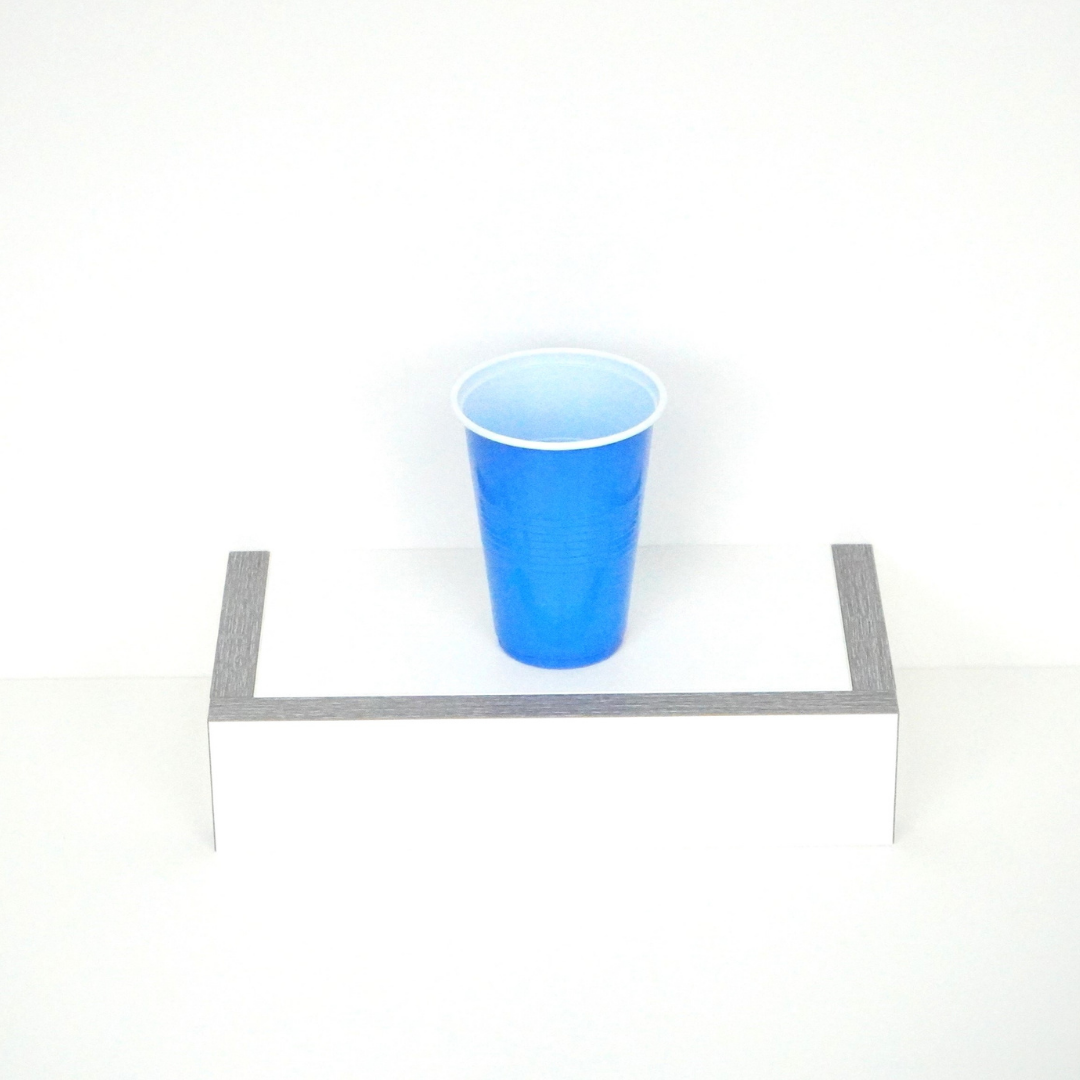 Single blue beer pong cup, 16 oz capacity, faced up, highlighting top design and shape